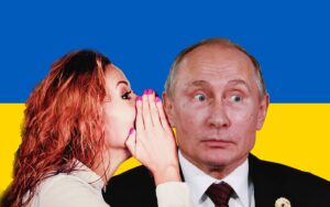 A woman whispering into a man's ear against a backdrop of the Ukrainian flag.