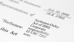 Close-up of a document highlighting the Sarbanes-Oxley Act of 2002, focusing on the date July 30, 2002, and the reference to corporate responsibility under 15 USC 7201.