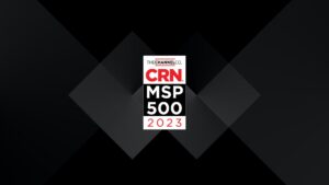 CRN MSP 500 2023 logo with dark geometric background.