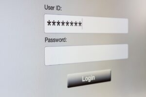 Close-up of a login screen with fields for User ID and Password, and a "Login" button. Following access credentials best practices, the User ID field is filled with masked characters.