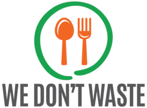 Logo of "we don't waste" featuring a green circle with an orange spoon and fork inside, next to the organization's name in black and orange text.