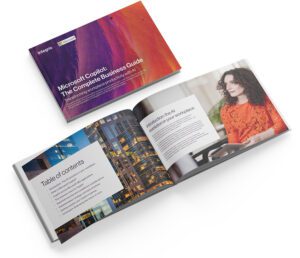 A closed and open business guide booklet titled "Microsoft Copilot: The Complete Business Guide," with the open pages showing a table of contents and a woman at a desk.