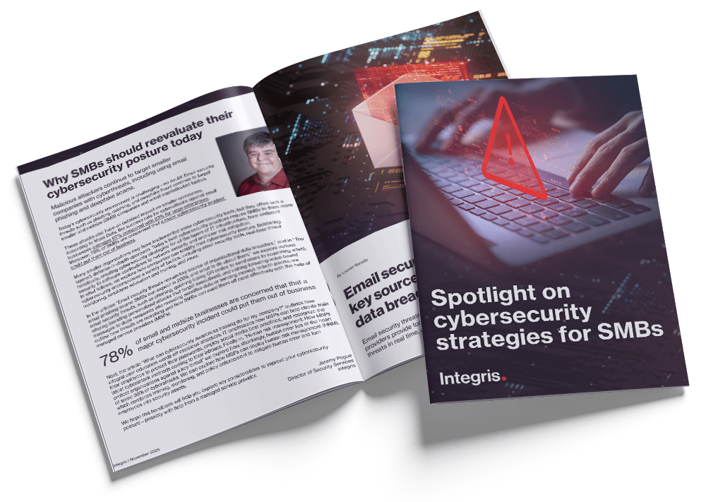 Two booklets titled "Spotlight on cybersecurity strategies for SMBs" by Integris, one open showing text and a photo, the other closed showing a keyboard and cybersecurity graphic on the cover.
