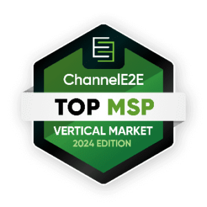 ChannelE2E Top MSP Vertical Market 2024 Edition badge featuring a green and black hexagonal design, white text on a black background—recognizing excellence in IT services.