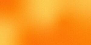 A blurred orange gradient background with soft transitions between lighter and darker shades of orange.
