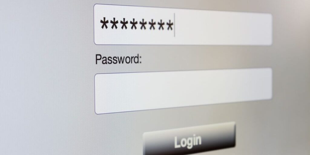 Close-up of a login screen with fields for User ID and Password, and a "Login" button. Following access credentials best practices, the User ID field is filled with masked characters.