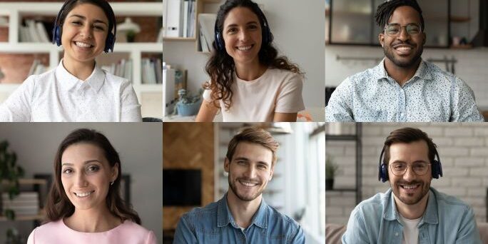 A video conference call with six smiling participants, each in their own cozy home setting, wearing headphones—truly the hallmark of good meetings.