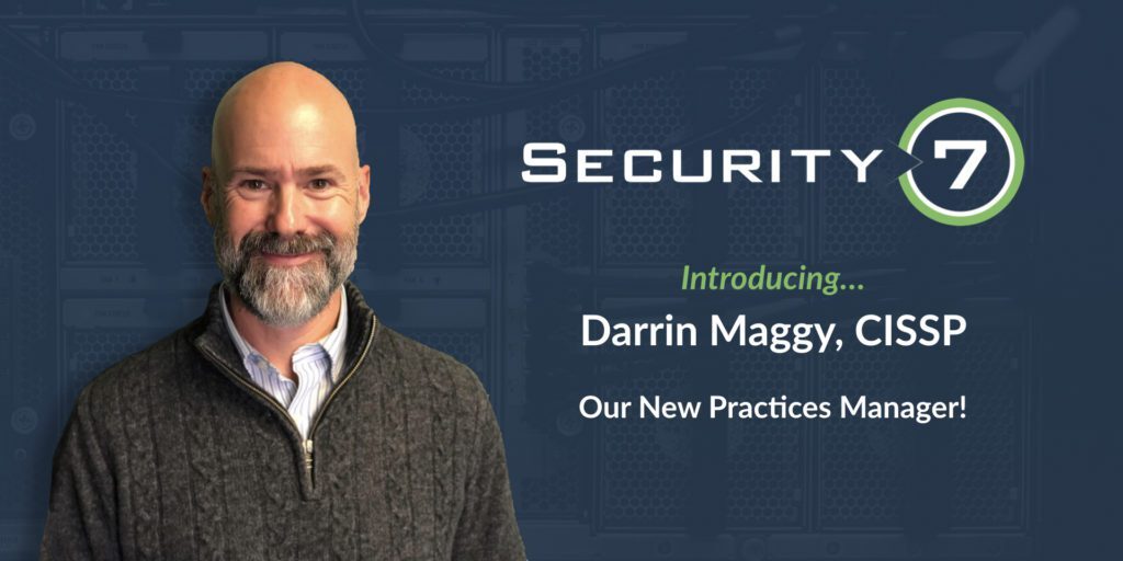 A bearded person in a sweater stands in front of a blue background with the text Security 7 Introducing... Darrin Maggy, CISSP Our New Practices Manager!.