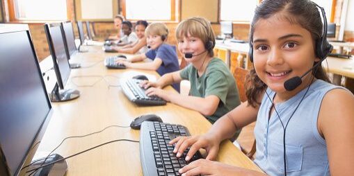 Cute pupils in computer class