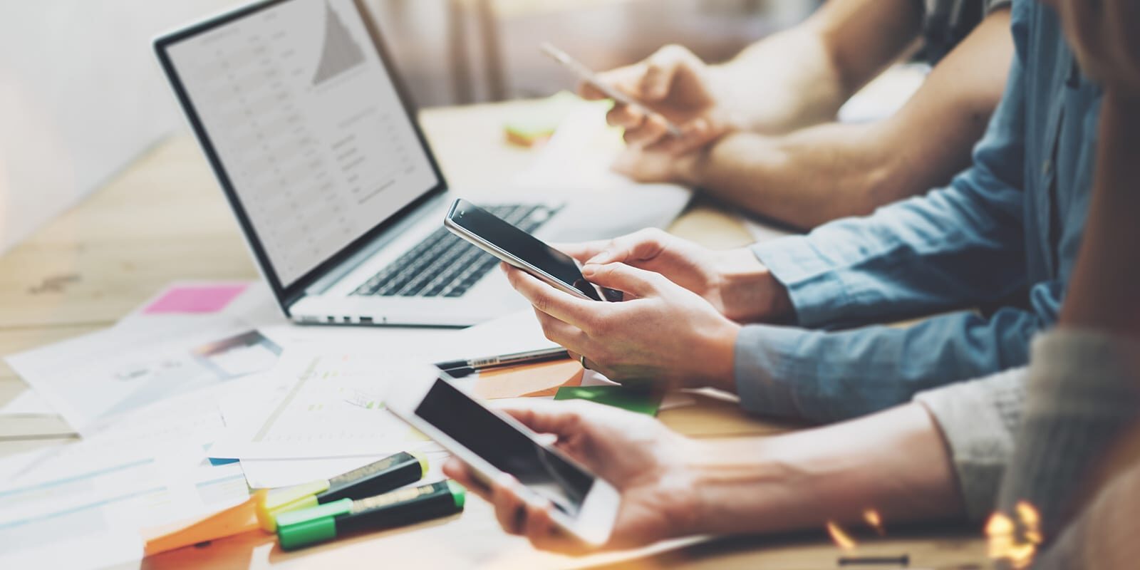 People looking at mobile devices