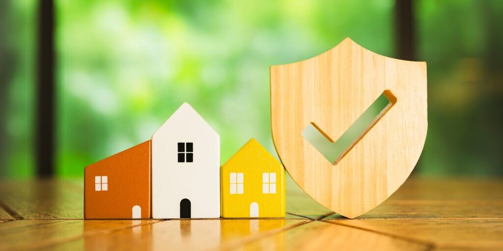 Wooden,House,Model,And,Real,Estate,Insurance,Ideas,,And,Small