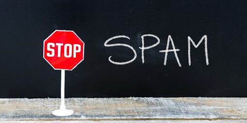 STOP SPAM message written on chalkboard